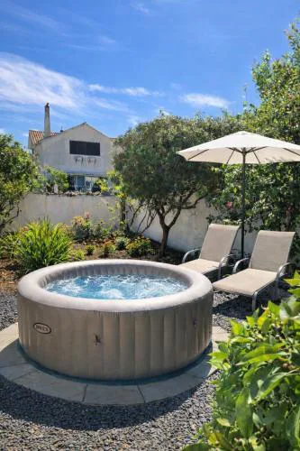 Casa acolhedora com jardim privado e BBQ