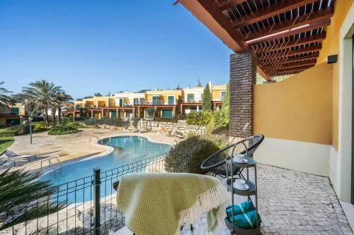 Relaxing Townhouse near Praia da Luz with Pool and Garden Oasis