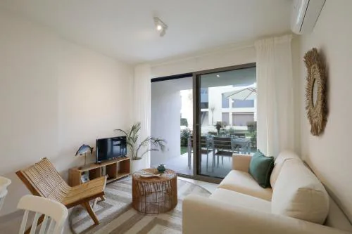 Elegant 2BR Apartment with Pool & Garden