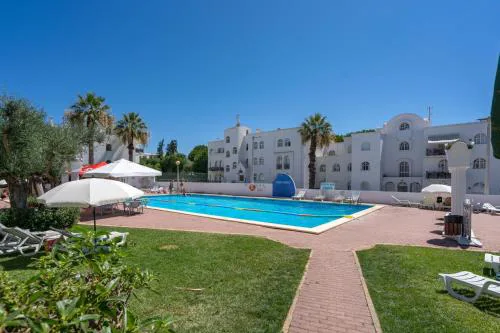 Elegant Flat with Pool & Balcony by HostWise