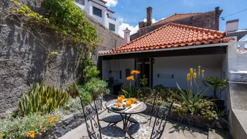Charming Garden Oasis by LovelyStay