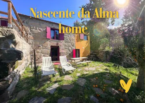 Nascente home place in nature next to a waterfall
