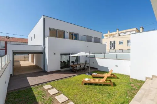 Stylish Home w/ Garage & Terrace by HostWise
