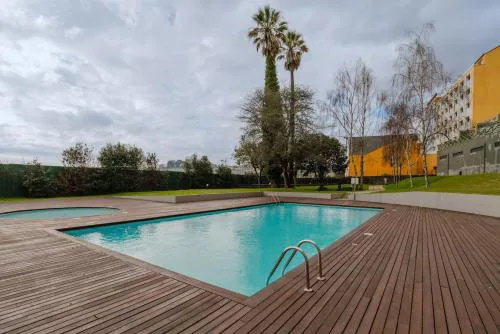 Elegant Riverfront Flat | Pool & Sports by Host Wise