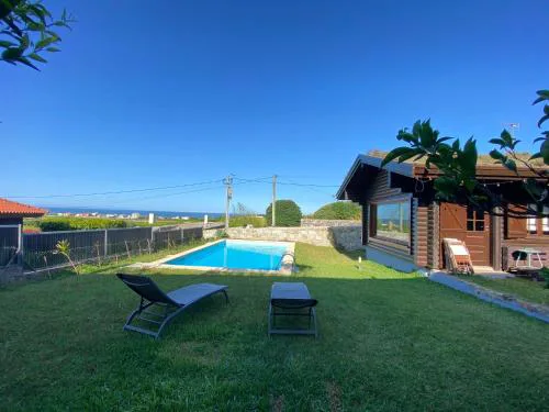 Encantadora moradia T1, com piscina e vista mar a 500m da praia