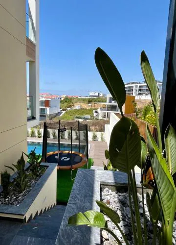 2-bedroom with pool, walk to beach & town