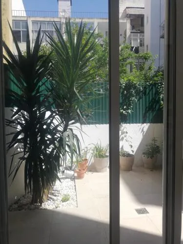 Apartamento encantador com pátio