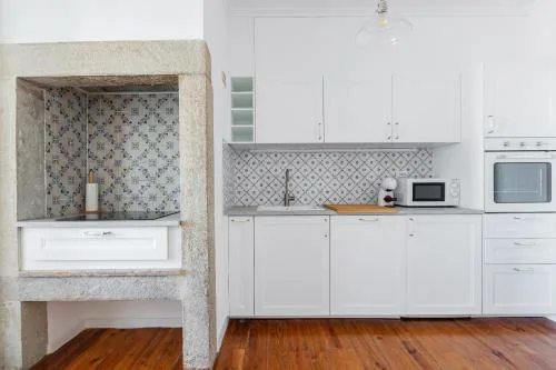 Art Gallery Graça 2BR with Blue Tiles & River View by NestAtLisbon