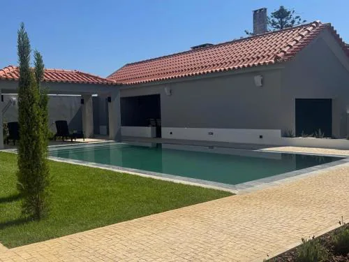 Casa com jardim perto da praia