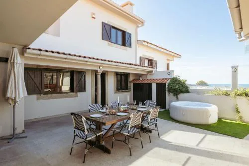 Beach Villa with Jacuzzi & Garage by HostWise