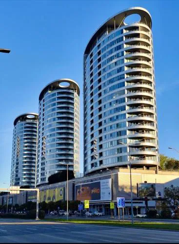 Three towers with parking