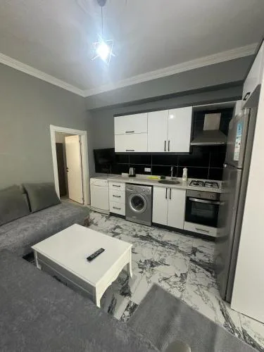 In the center, 6-7 minutes to the airport, close to the sea and coves