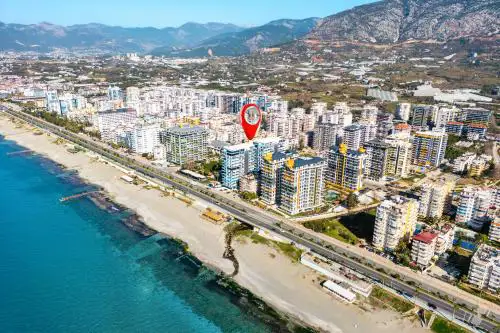 Sea View 1BR Apt - Steps to Beach - Modern Residence